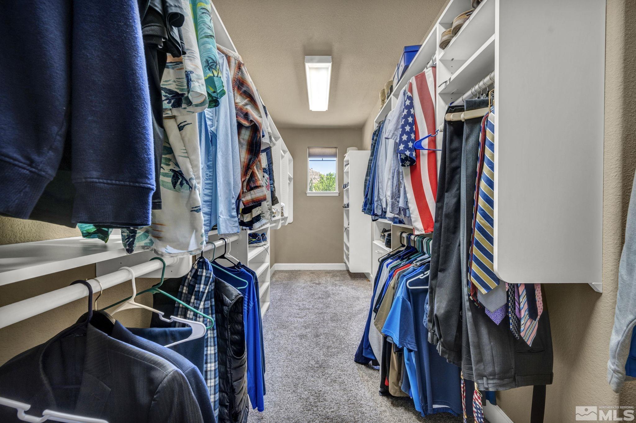 2713 Robb Drive Reno, NV 89523 - Photo 14 of 39 a view of walk in closet with clothes