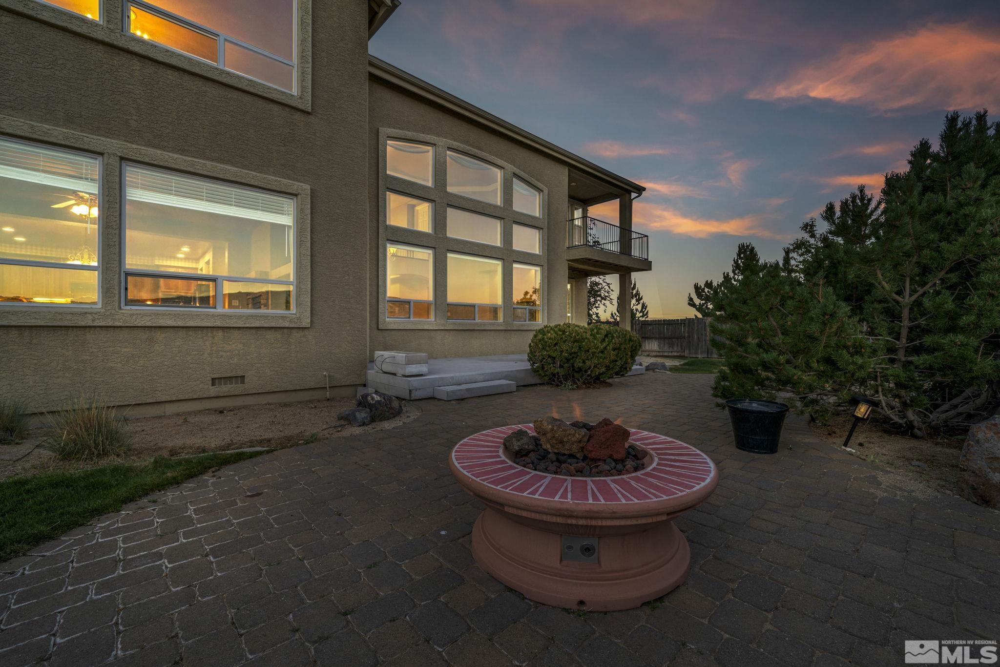 2713 Robb Drive Reno, NV 89523 - Photo 19 of 39 a table and chairs in a backyard