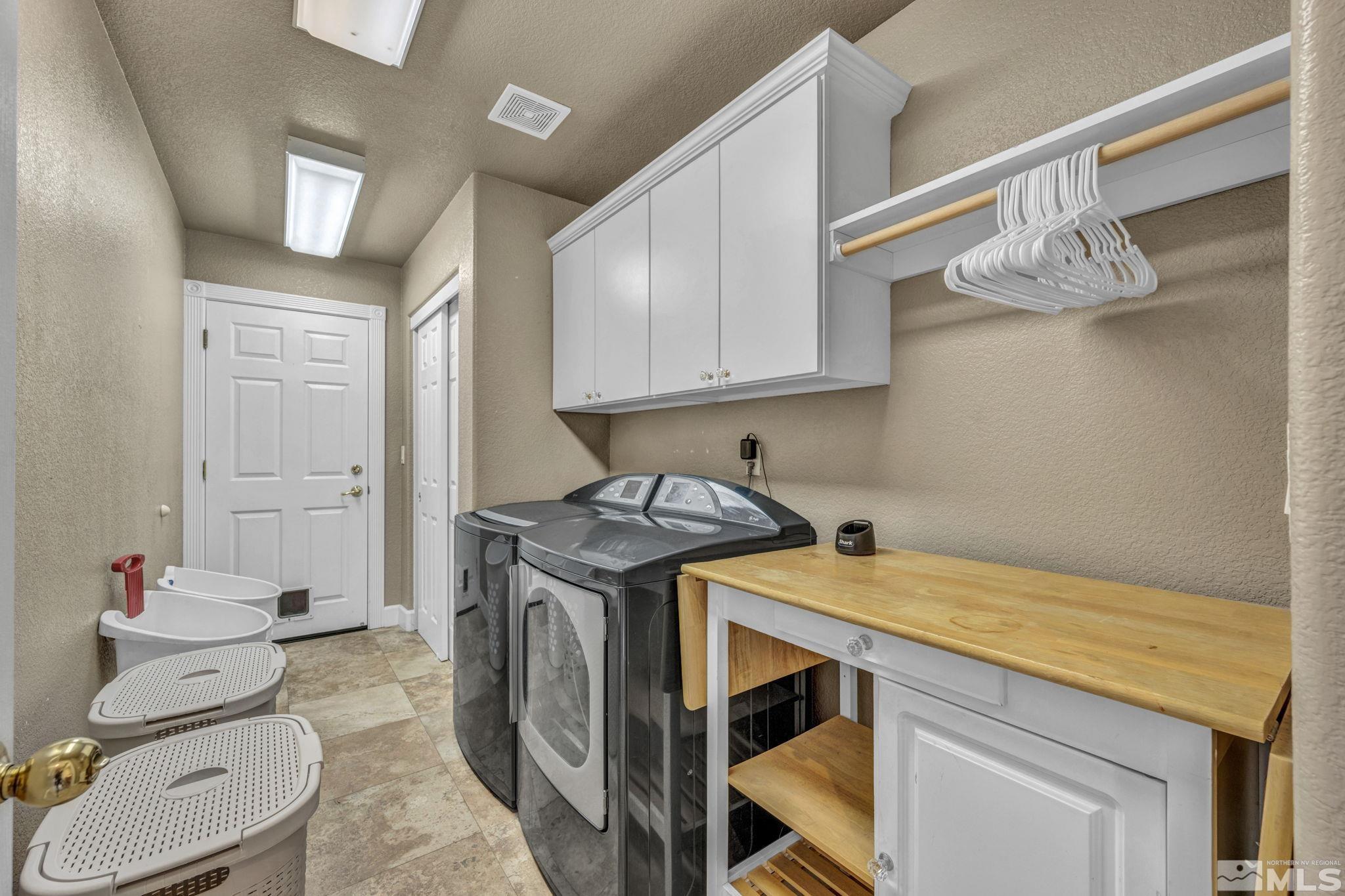 2713 Robb Drive Reno, NV 89523 - Photo 32 of 39 a utility room with sink dryer and washer