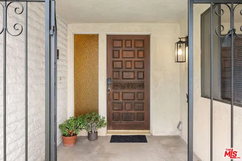 a view of front door with small space