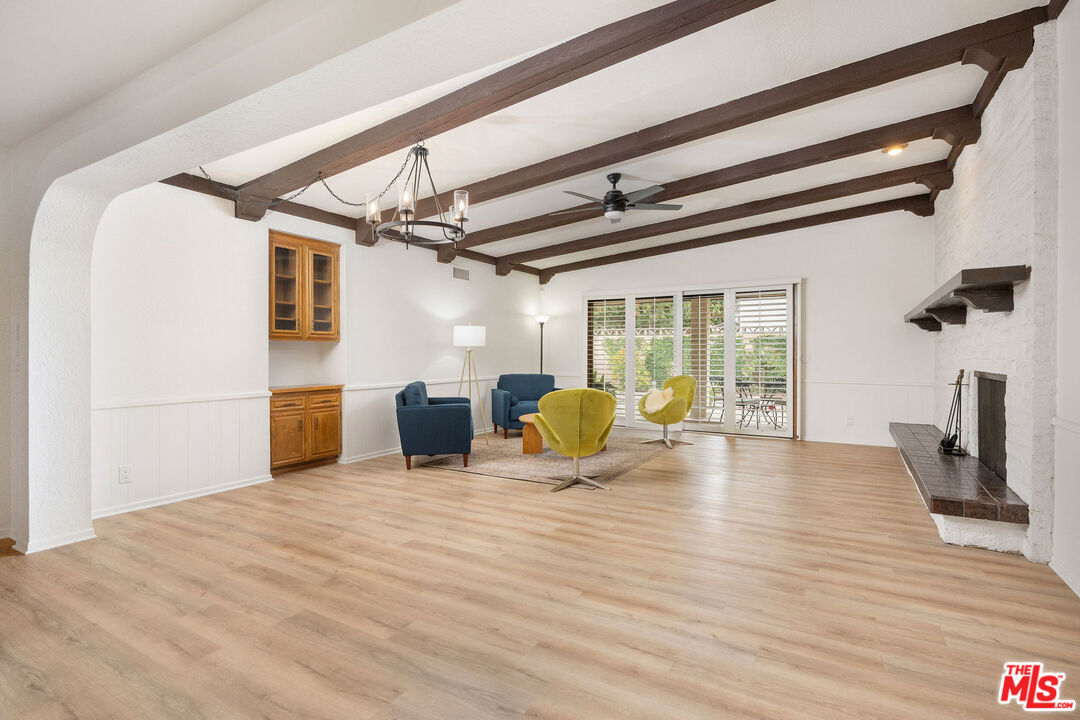 882 West 17th Street Upland, CA 91784 - Photo 3 of 27 a view of a livingroom with wooden floor and furniture