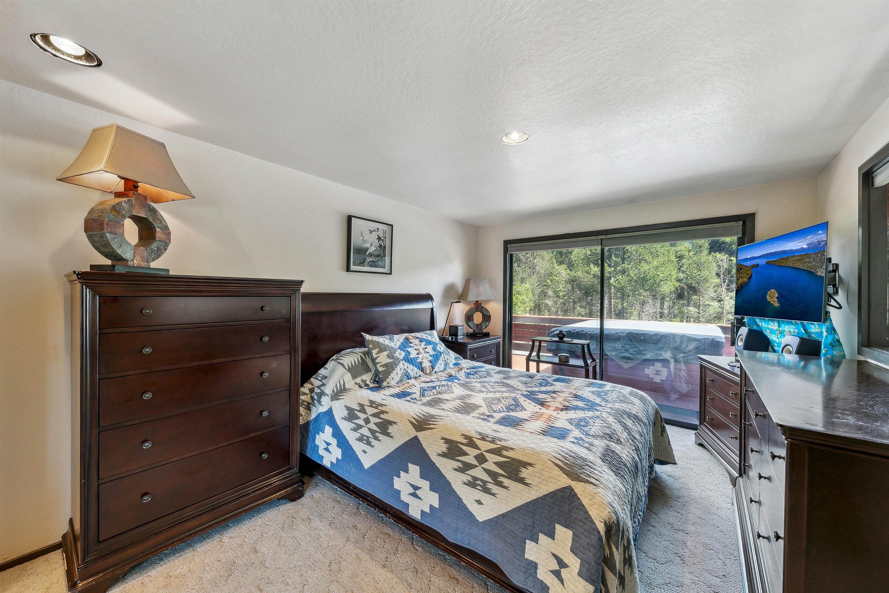 720 Olympic Vly Road Olympic Valley, CA 96146 - Photo 15 of 28 a bedroom with a bed and a window