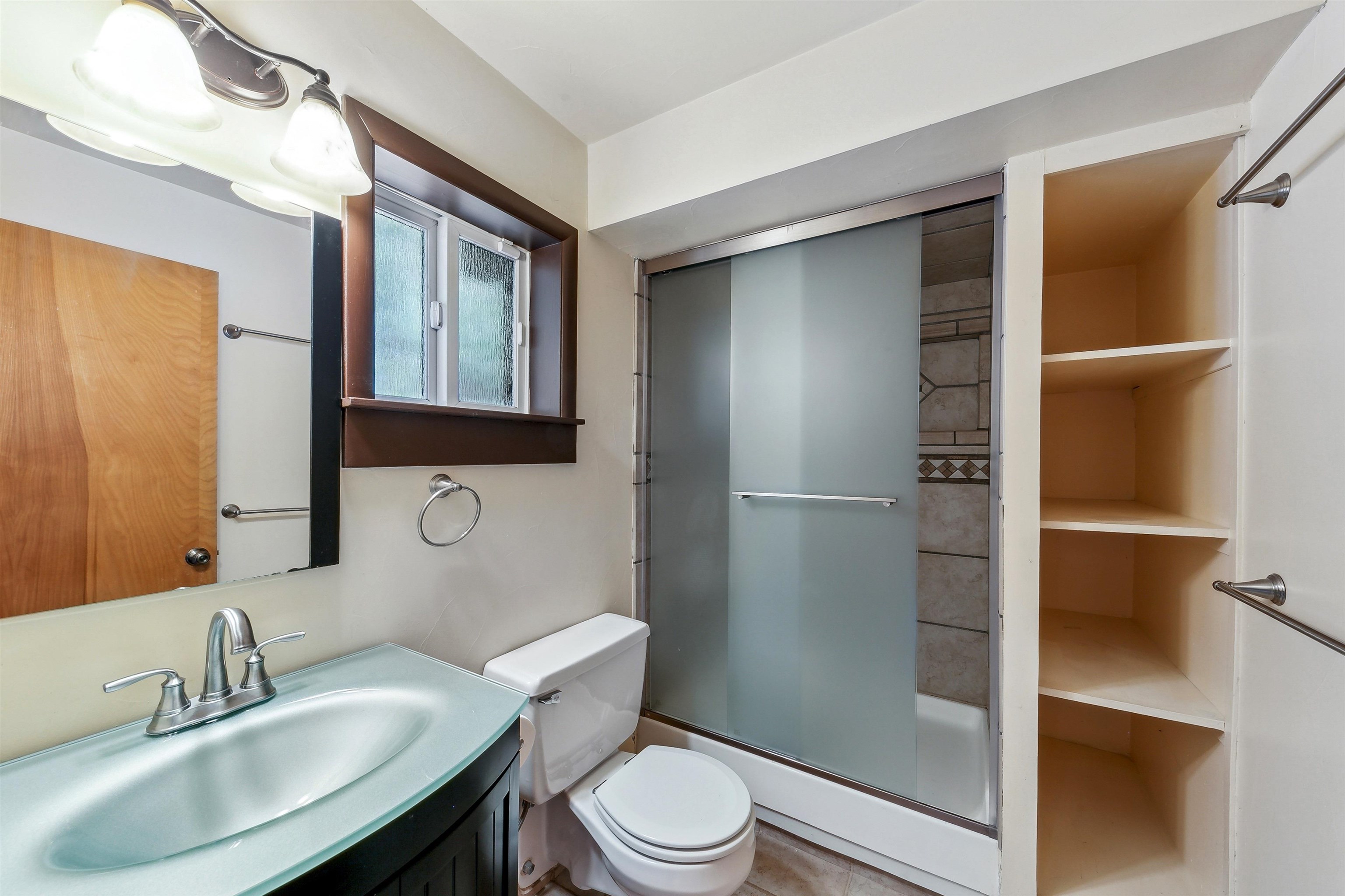 720 Olympic Vly Road Olympic Valley, CA 96146 - Photo 18 of 28 a bathroom with a sink toilet and shower