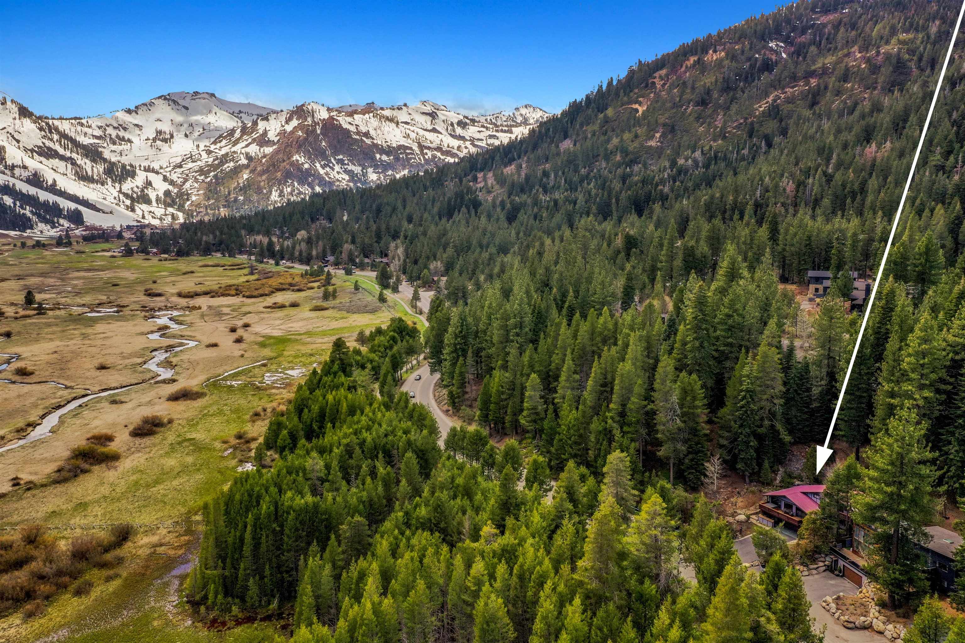 720 Olympic Vly Road Olympic Valley, CA 96146 - Photo 2 of 28 a view of a lake with mountains in the background