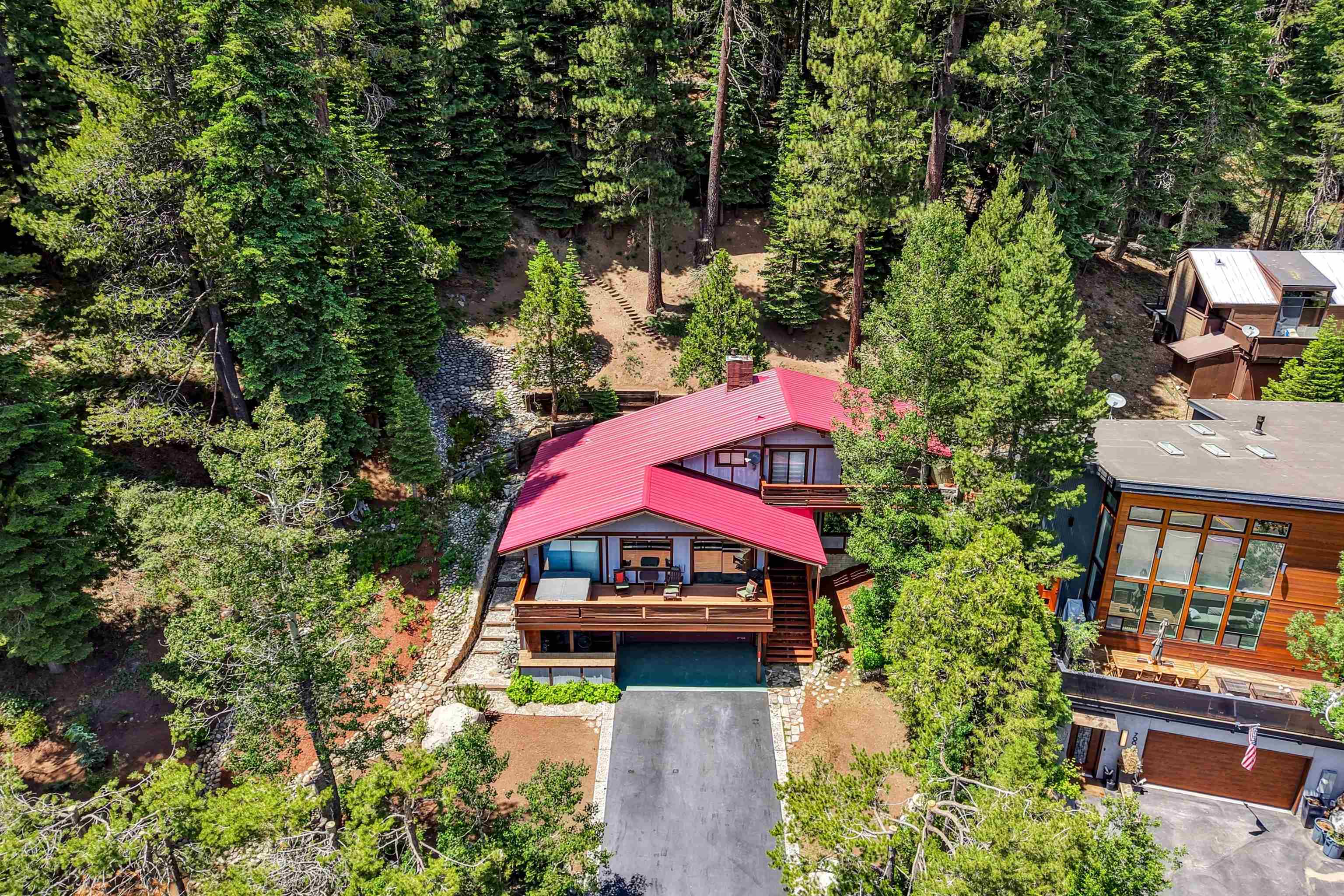 720 Olympic Vly Road Olympic Valley, CA 96146 - Photo 5 of 28 an aerial view of a house with swimming pool outdoor seating and yard