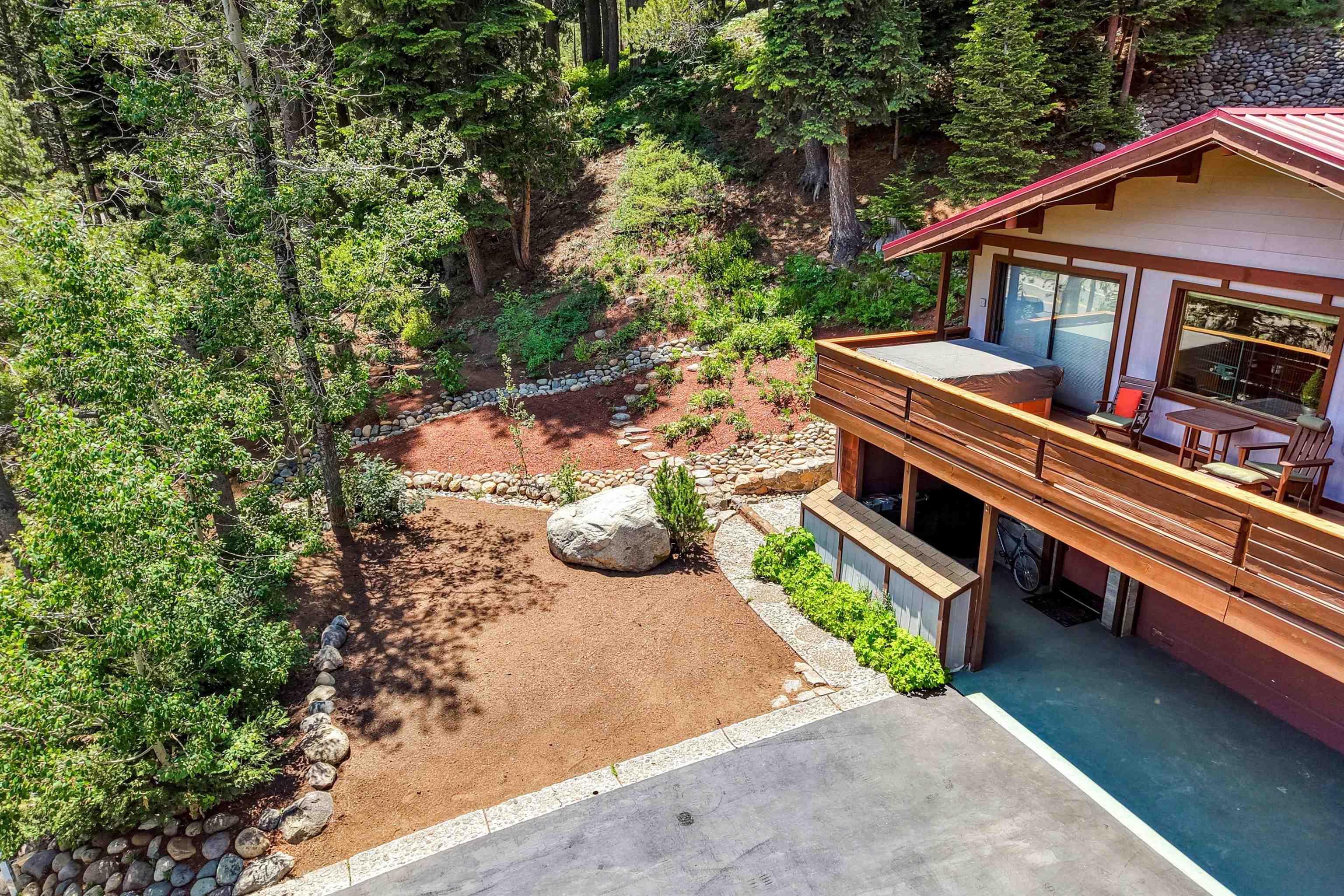 720 Olympic Vly Road Olympic Valley, CA 96146 - Photo 6 of 28 a view of a house with pool and wooden fence