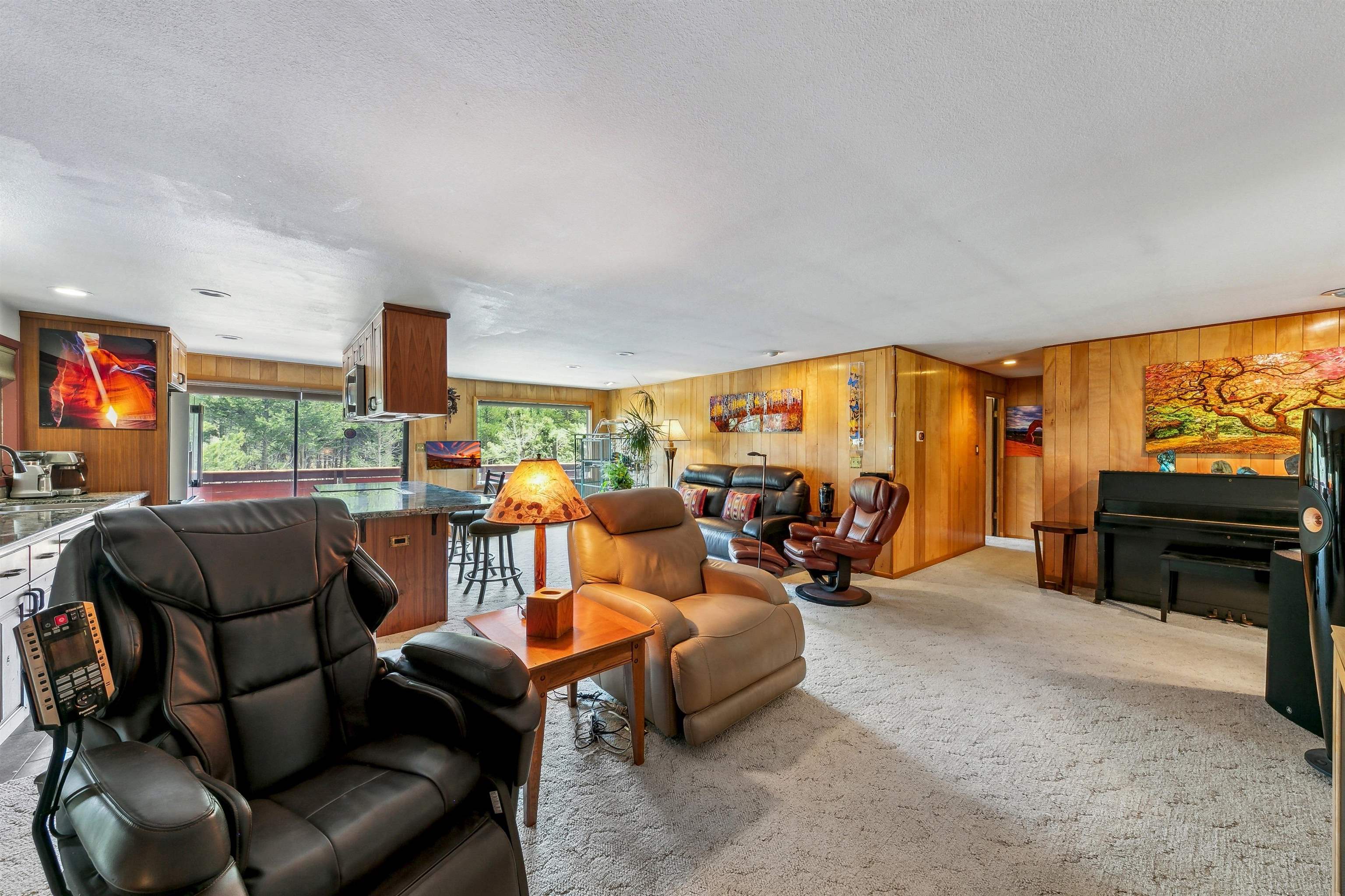 720 Olympic Vly Road Olympic Valley, CA 96146 - Photo 10 of 28 a living room with furniture and a flat screen tv