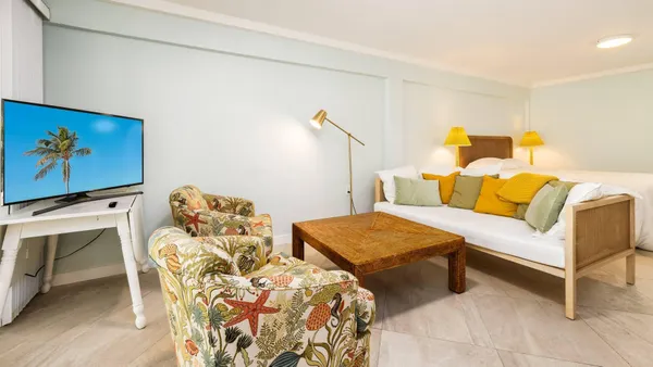 a bedroom with furniture and a couch