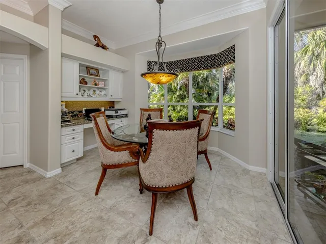 a spacious bedroom with a bed and a flat screen tv