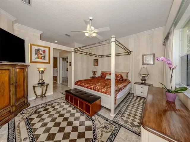 a bathroom with a sink a toilet and a shower