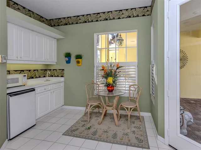 a view of a house with garden and plants