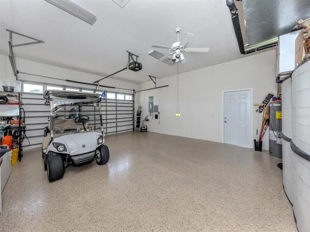 a view of a chairs and table in the patio