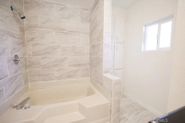 a close up of a bathtub curtain