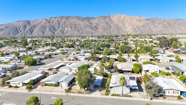 an aerial view of residential houses and street