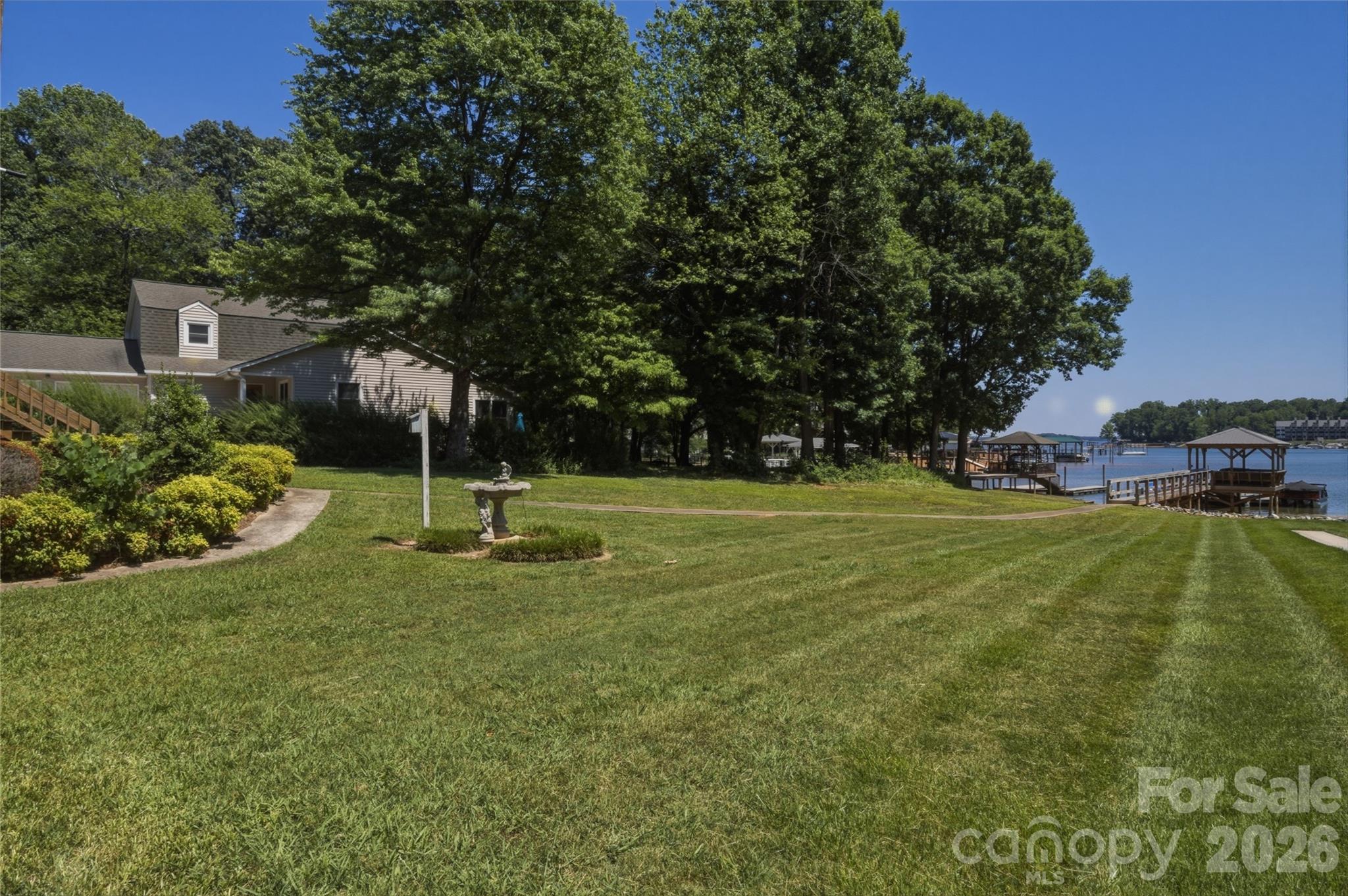 8226 Normandy Road Denver, NC 28037 - Photo 4 of 29 a view of a park with large trees