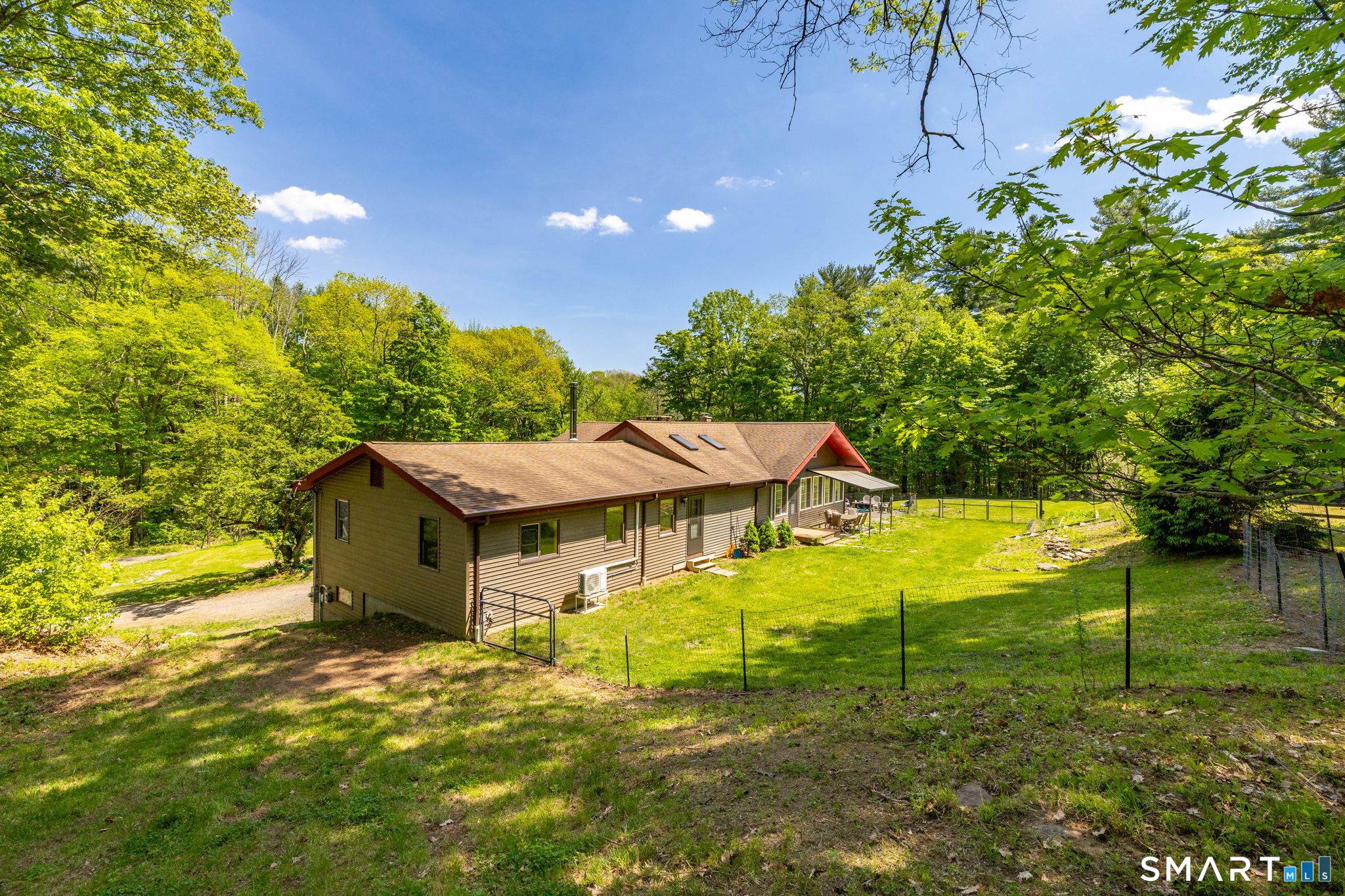 250 Center Hill Road Barkhamsted, CT 06063 - Photo 31 of 40 a view of a house with a yard