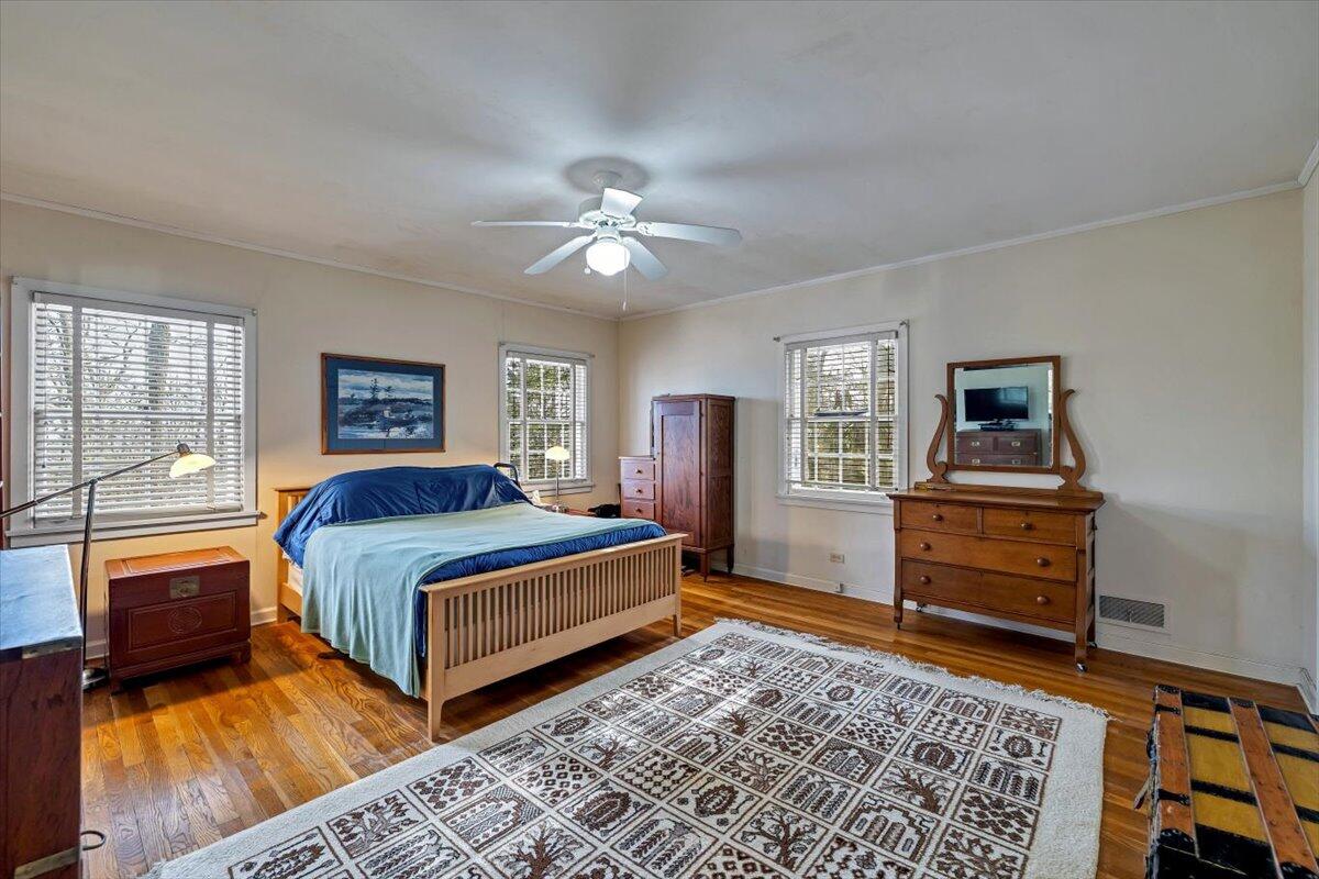 331 Summit Drive Cresco, PA 18326 - Photo 11 of 43 a bedroom with a bed and wooden floor