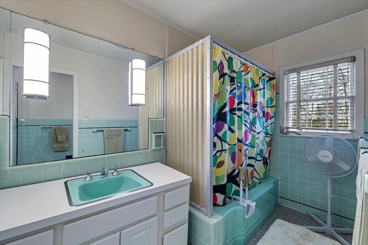 331 Summit Drive Cresco, PA 18326 - Photo 13 of 43 a bathroom with a sink a vanity and a mirror