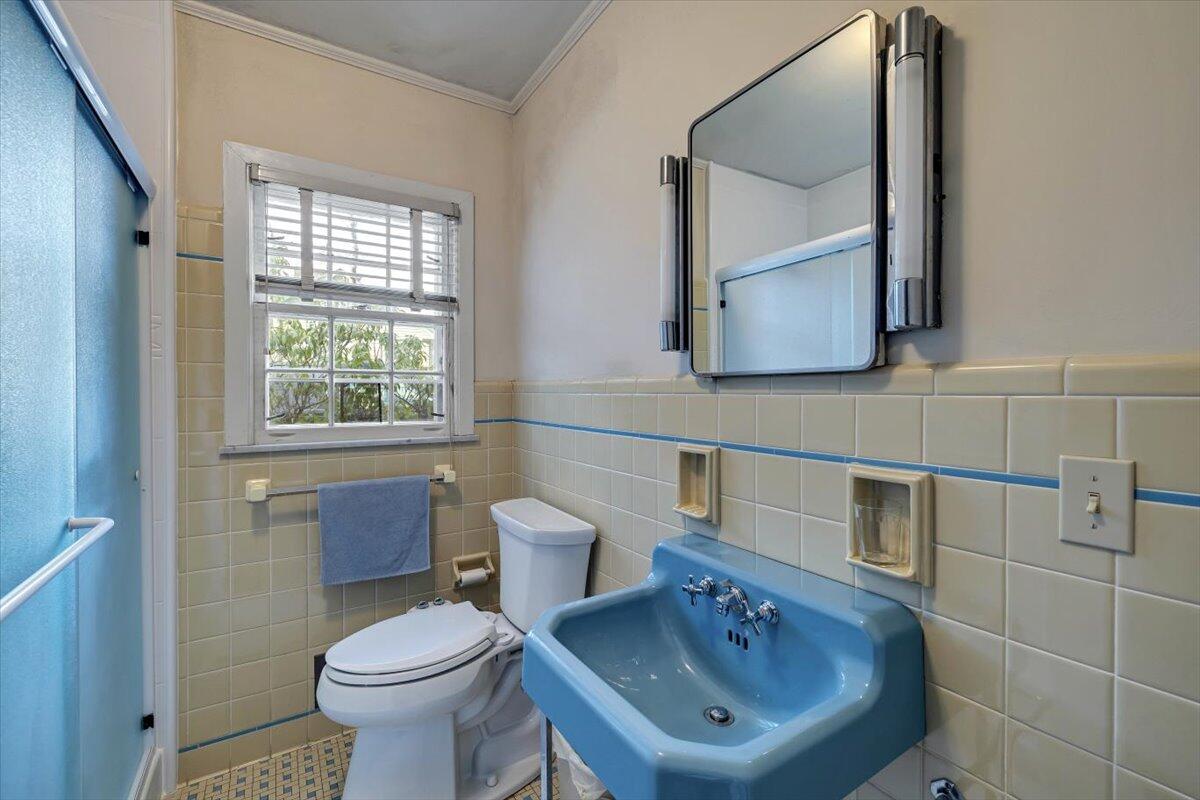 331 Summit Drive Cresco, PA 18326 - Photo 17 of 43 a bathroom with a toilet sink and mirror