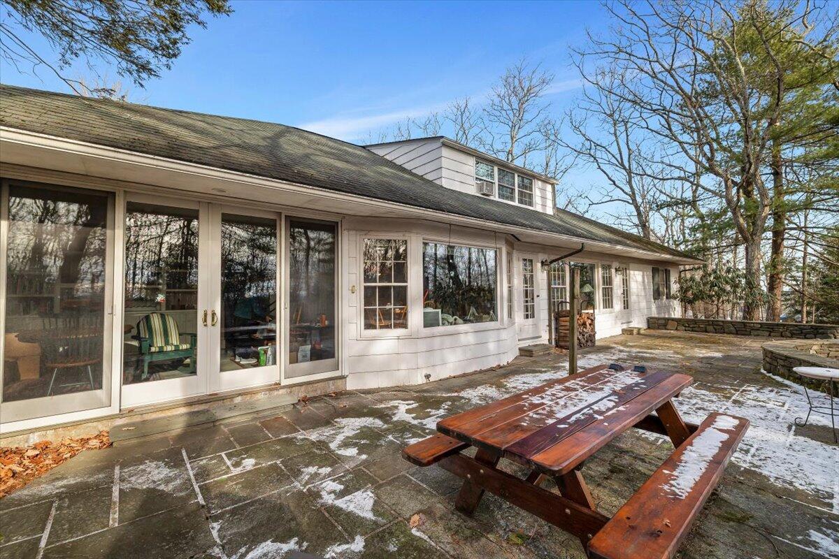 331 Summit Drive Cresco, PA 18326 - Photo 23 of 43 a view of a house with backyard sitting area and garden