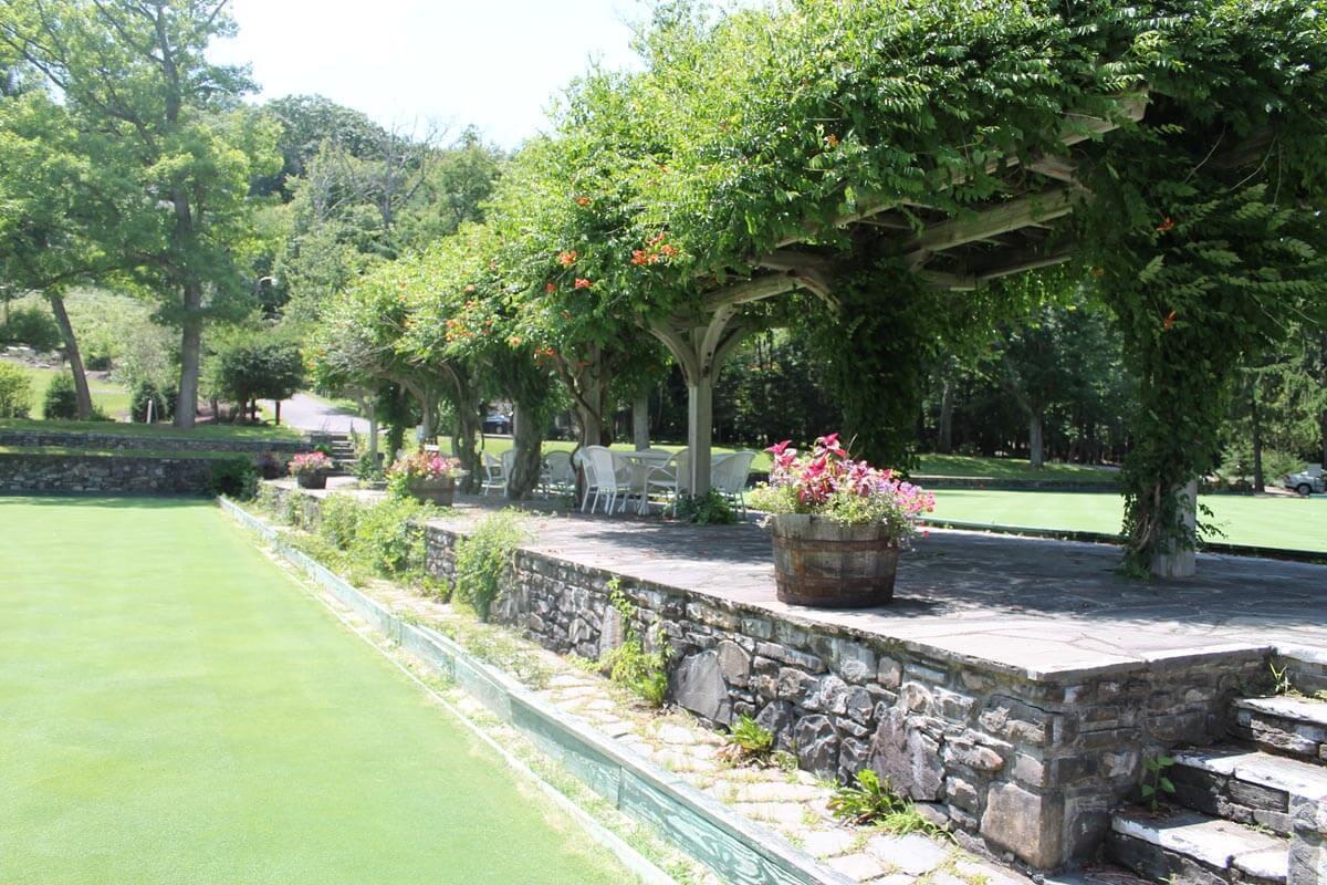 331 Summit Drive Cresco, PA 18326 - Photo 41 of 43 a front view of a garden with fountain