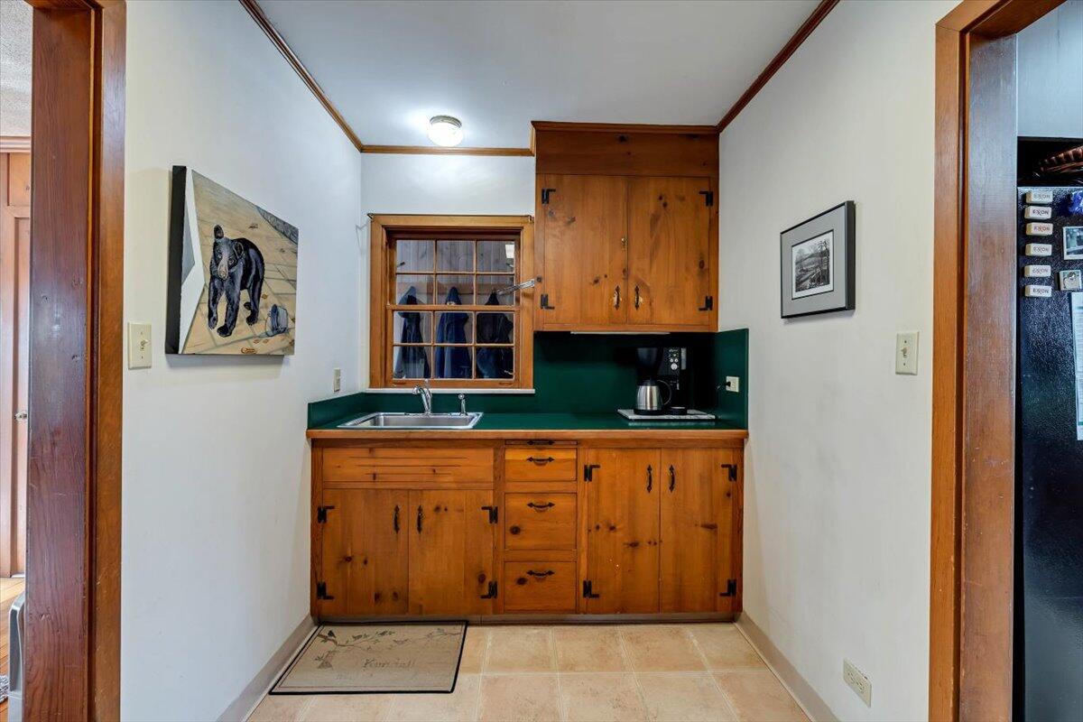 331 Summit Drive Cresco, PA 18326 - Photo 9 of 43 a kitchen with stainless steel appliances granite countertop a refrigerator and a stove