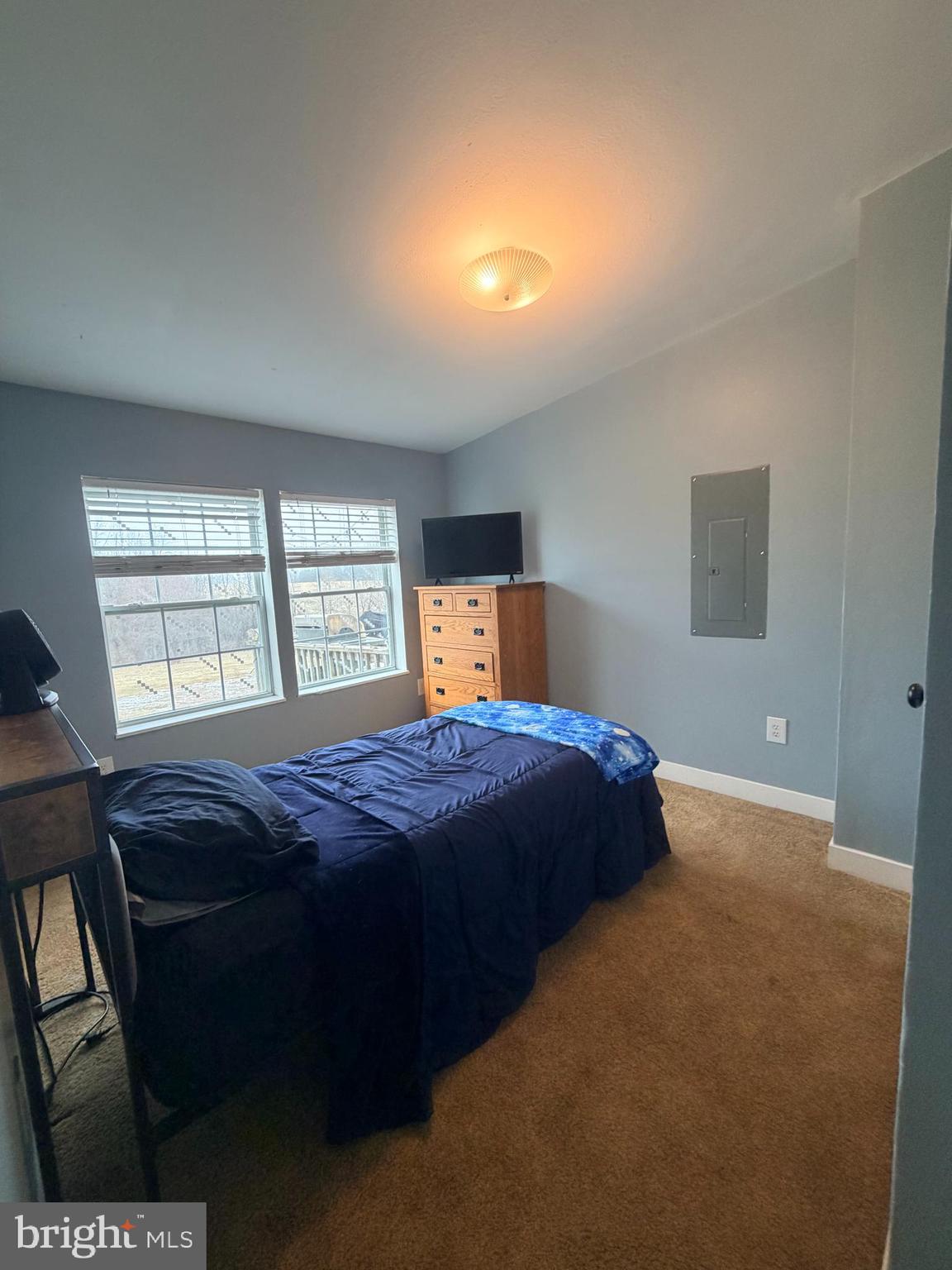 520 Wheeler School Road Whiteford, MD 21160 - Photo 14 of 37 a bedroom with a bed and a window