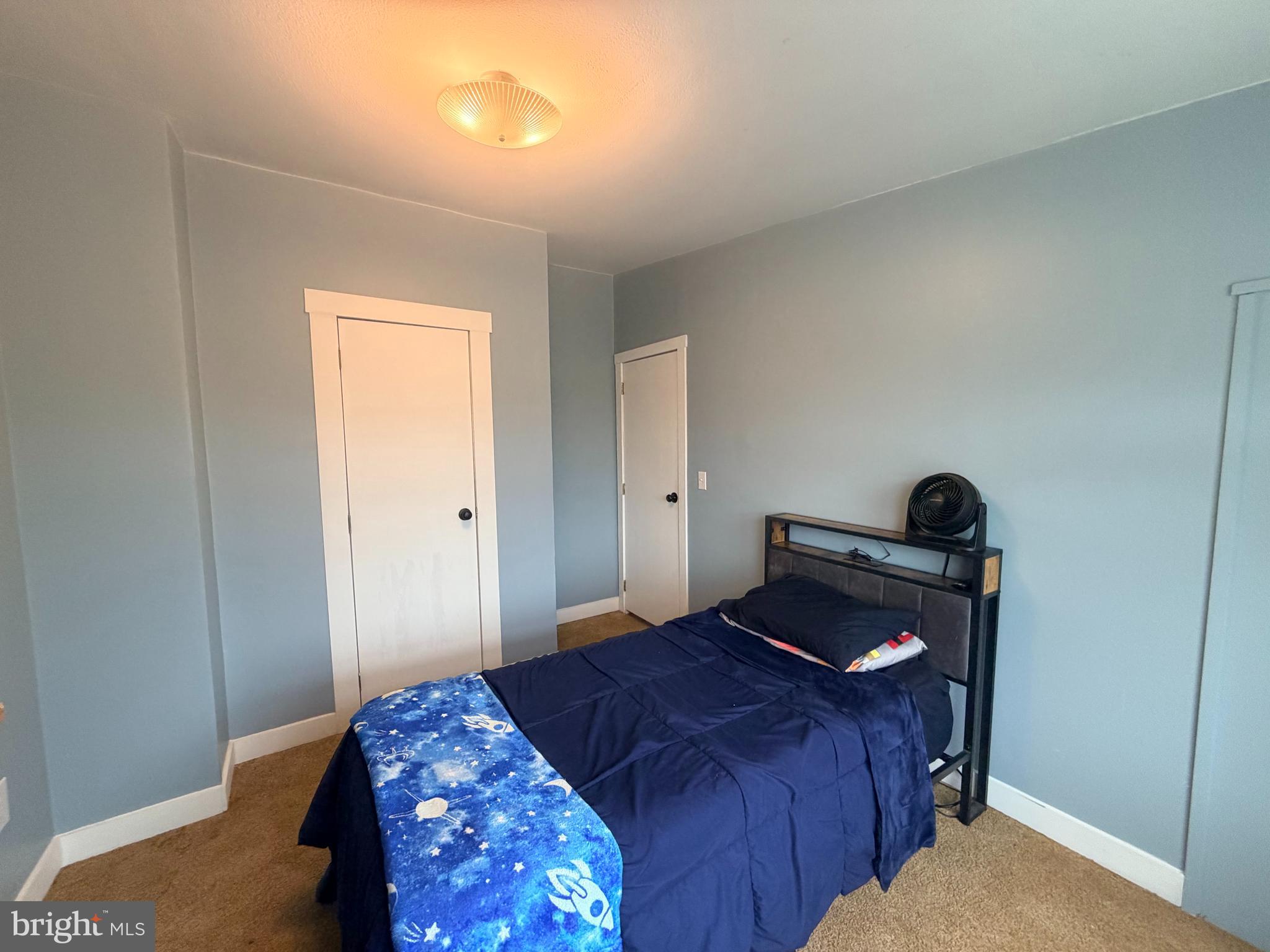 520 Wheeler School Road Whiteford, MD 21160 - Photo 16 of 37 a bedroom with a bed and a window