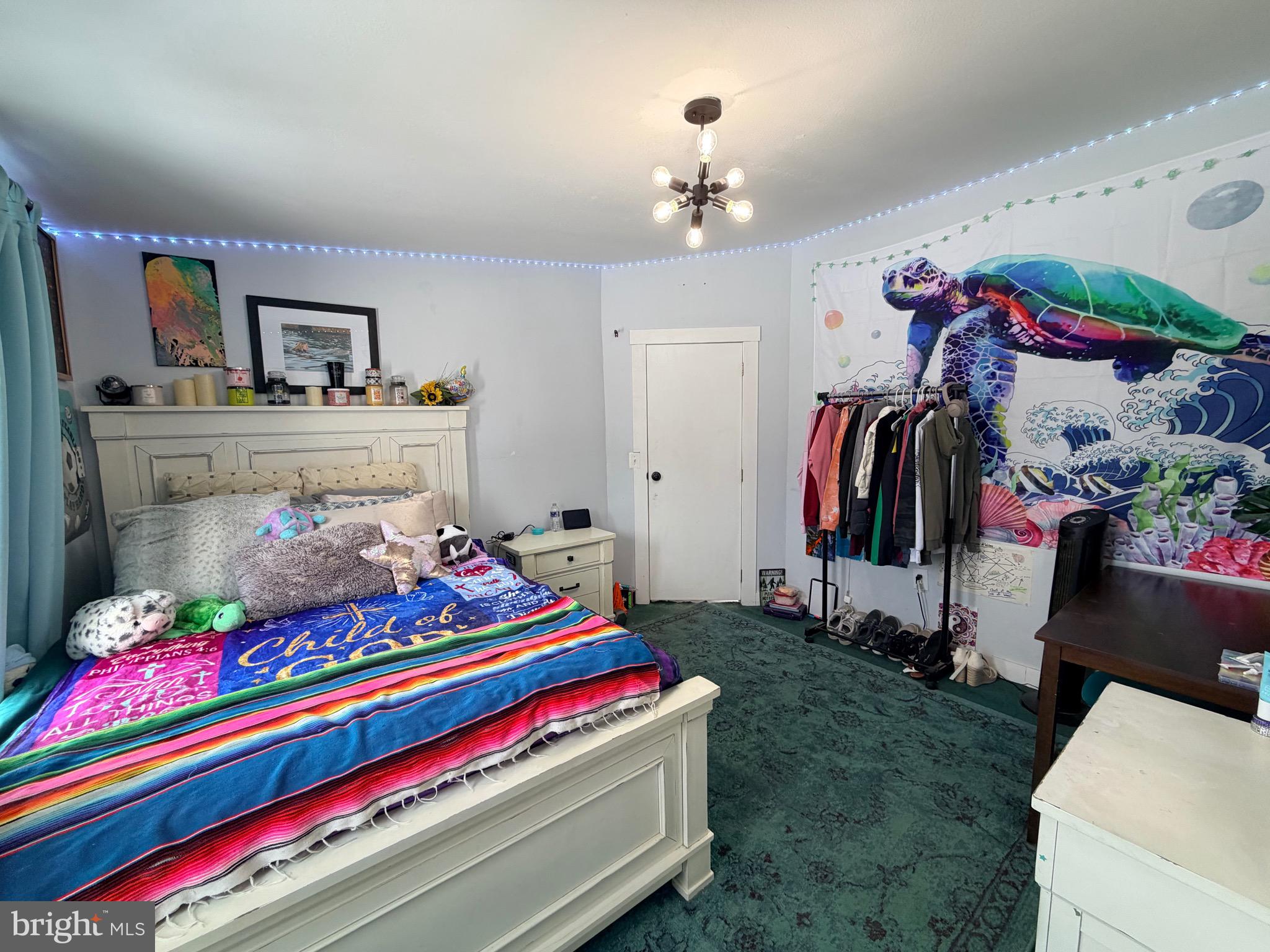 520 Wheeler School Road Whiteford, MD 21160 - Photo 17 of 37 a living room with furniture and a baby crib