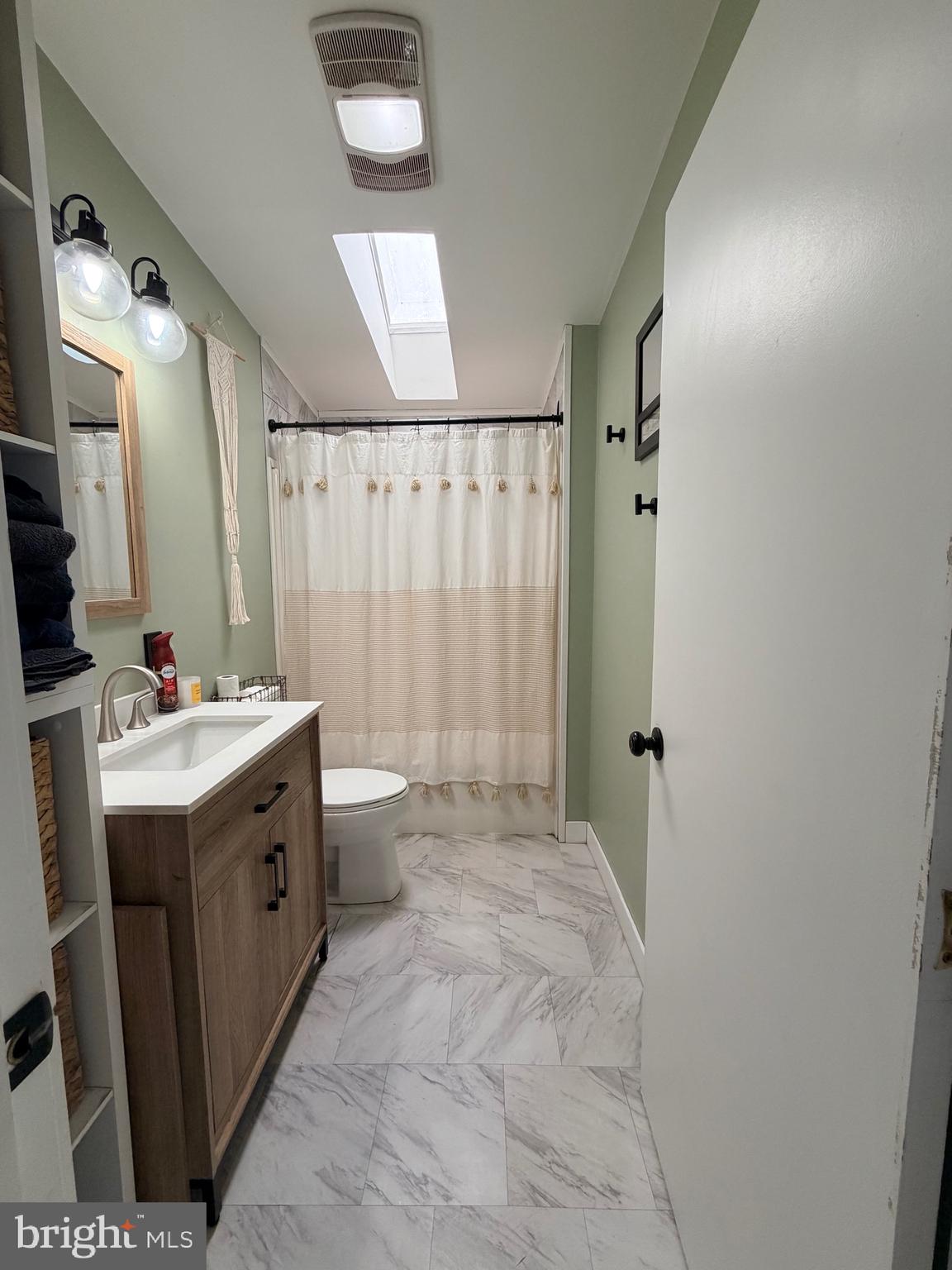 520 Wheeler School Road Whiteford, MD 21160 - Photo 21 of 37 a bathroom with a double vanity sink toilet and shower