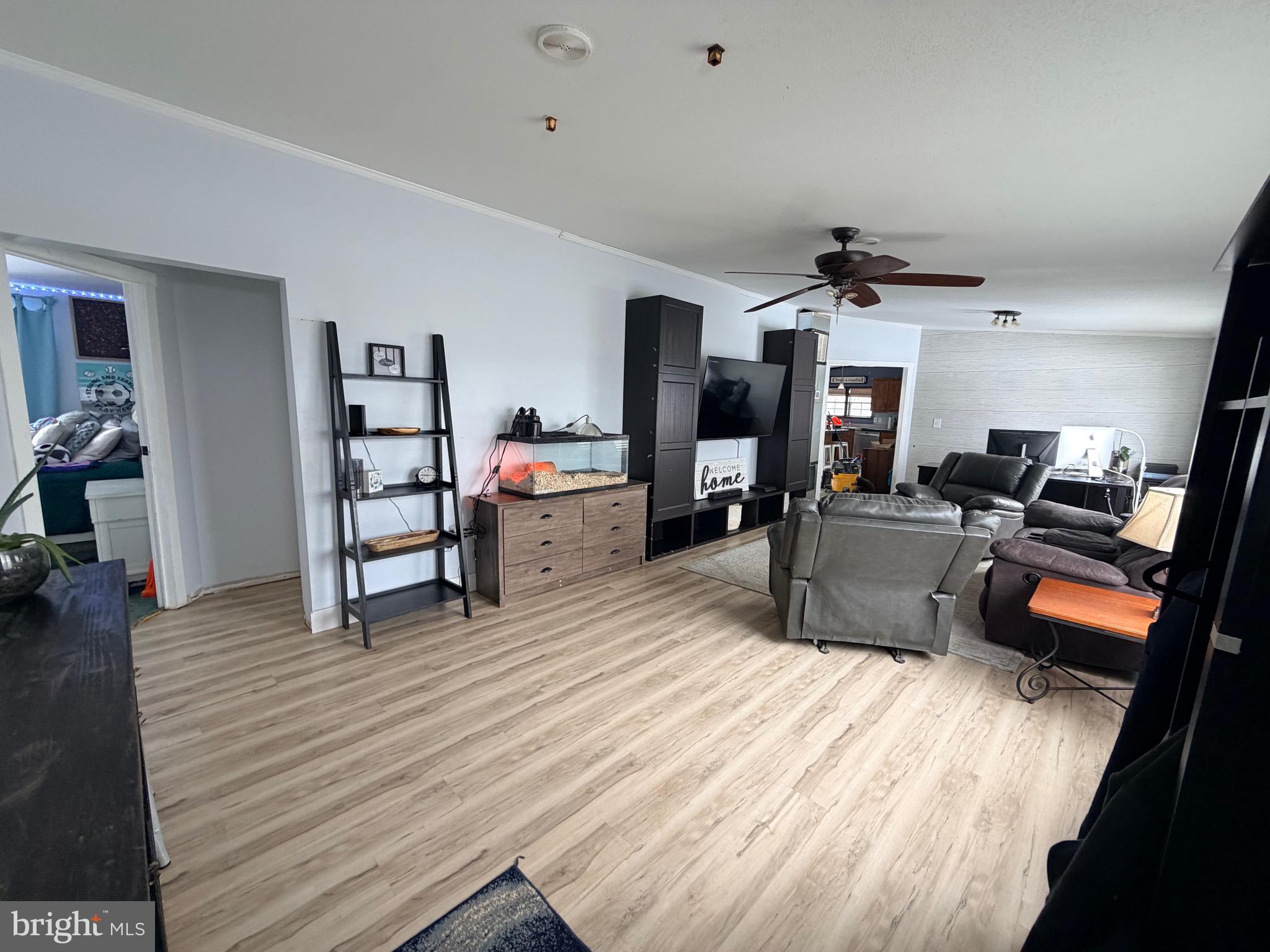 520 Wheeler School Road Whiteford, MD 21160 - Photo 5 of 37 a living room with furniture and a flat screen tv