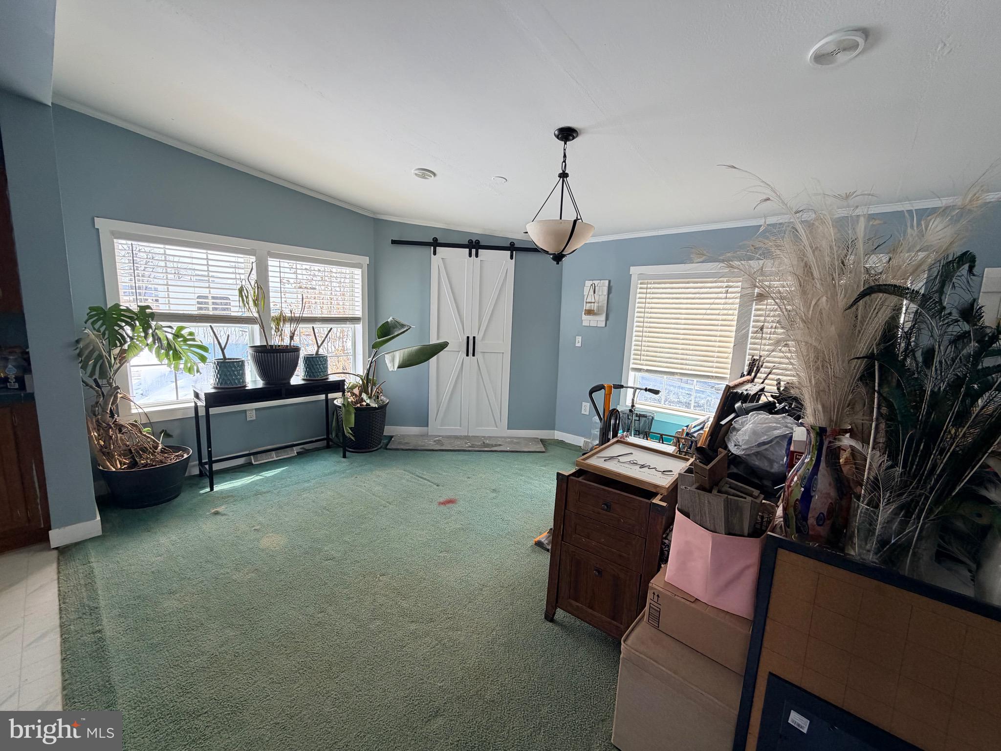 520 Wheeler School Road Whiteford, MD 21160 - Photo 6 of 37 a living room with furniture and a window