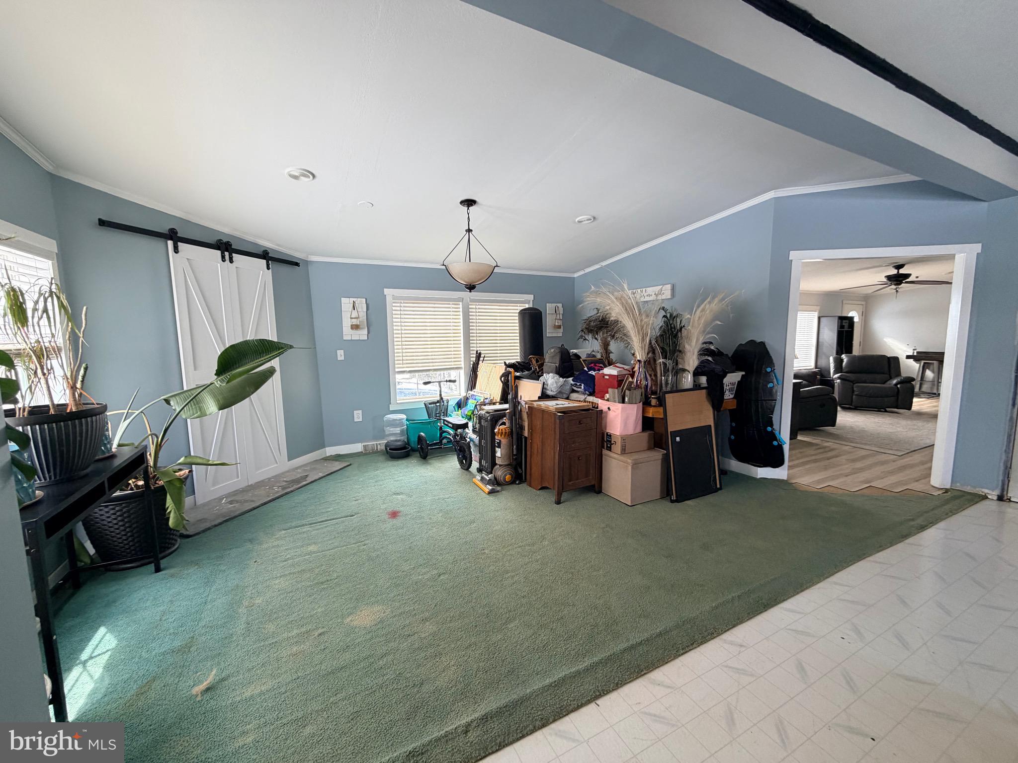 520 Wheeler School Road Whiteford, MD 21160 - Photo 7 of 37 a living room with furniture and a large window