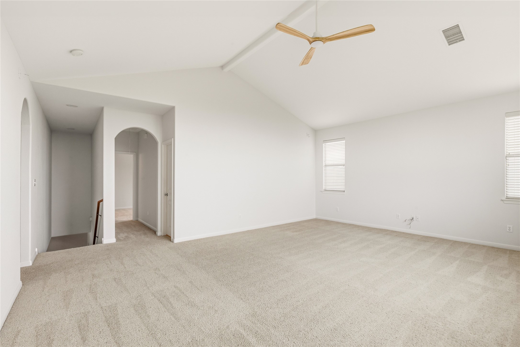 1432 Tom Sawyer Road Austin, TX 78737 - Photo 21 of 33 A spacious upstairs room with vaulted ceilings and abundant natural light.