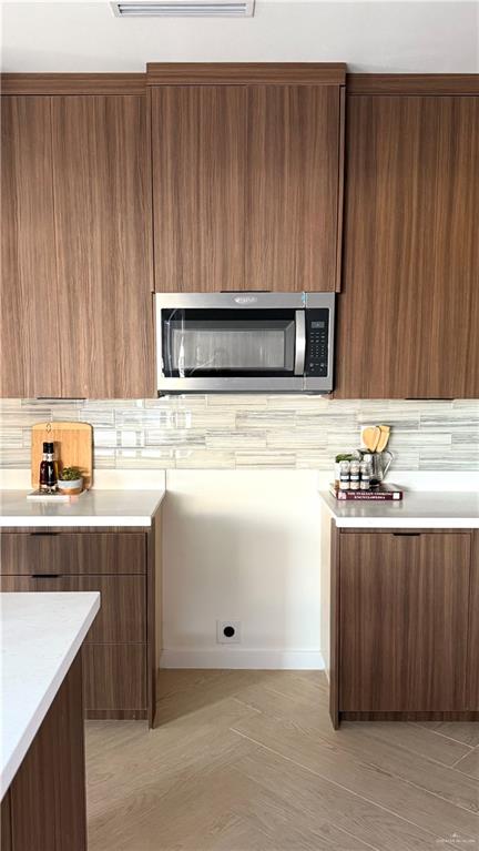 2901 Estevan Street, Unit 4 Mission, TX 78574 - Photo 13 of 27 a kitchen with a stove and a sink
