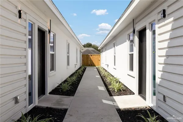 a view of back yard of the house