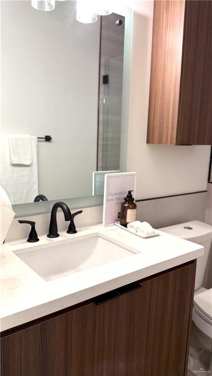 2901 Estevan Street, Unit 4 Mission, TX 78574 - Photo 24 of 27 a bathroom with a sink and a mirror