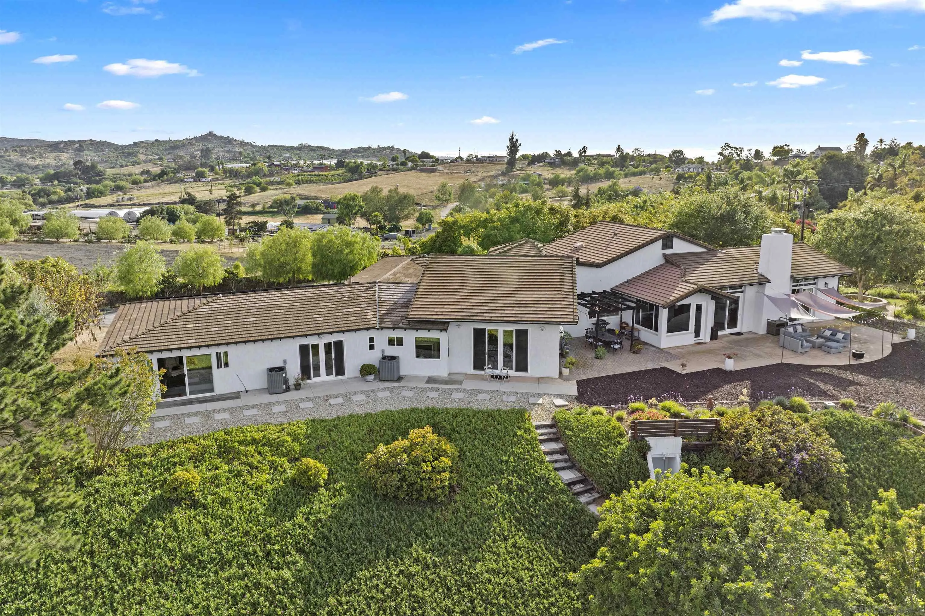 30659 Diaz Road Valley Center, CA 92082 - Photo 34 of 44 a aerial view of a house with a big yard