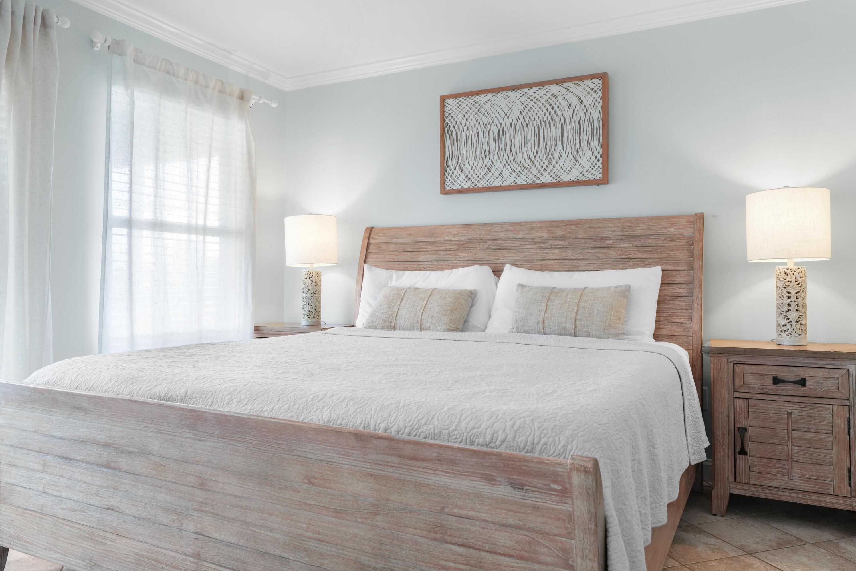 12 Windancer Lane Miramar Beach, FL 32550 - Photo 27 of 42 a bedroom with a bed and a window