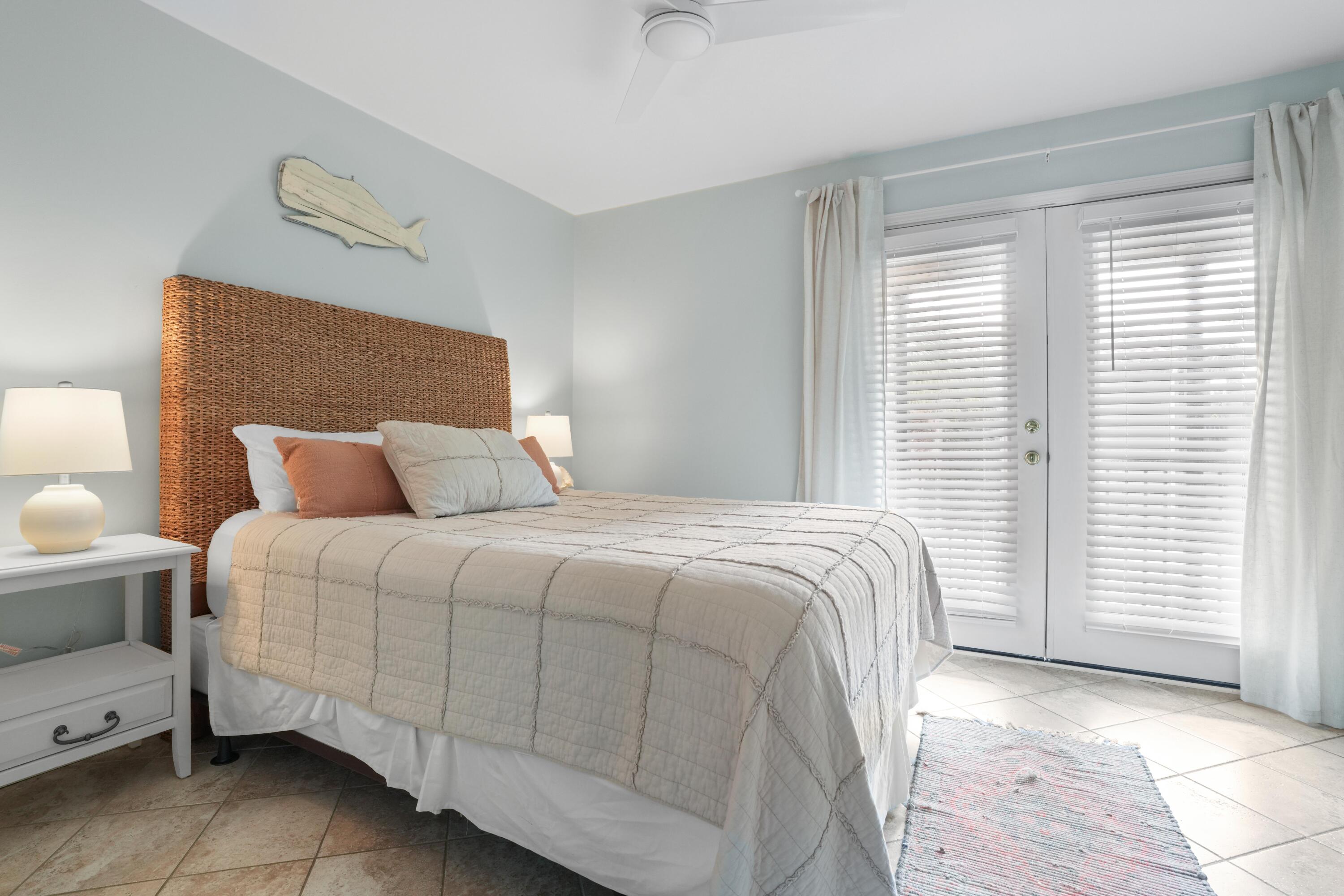 12 Windancer Lane Miramar Beach, FL 32550 - Photo 30 of 42 a bedroom with a bed and window