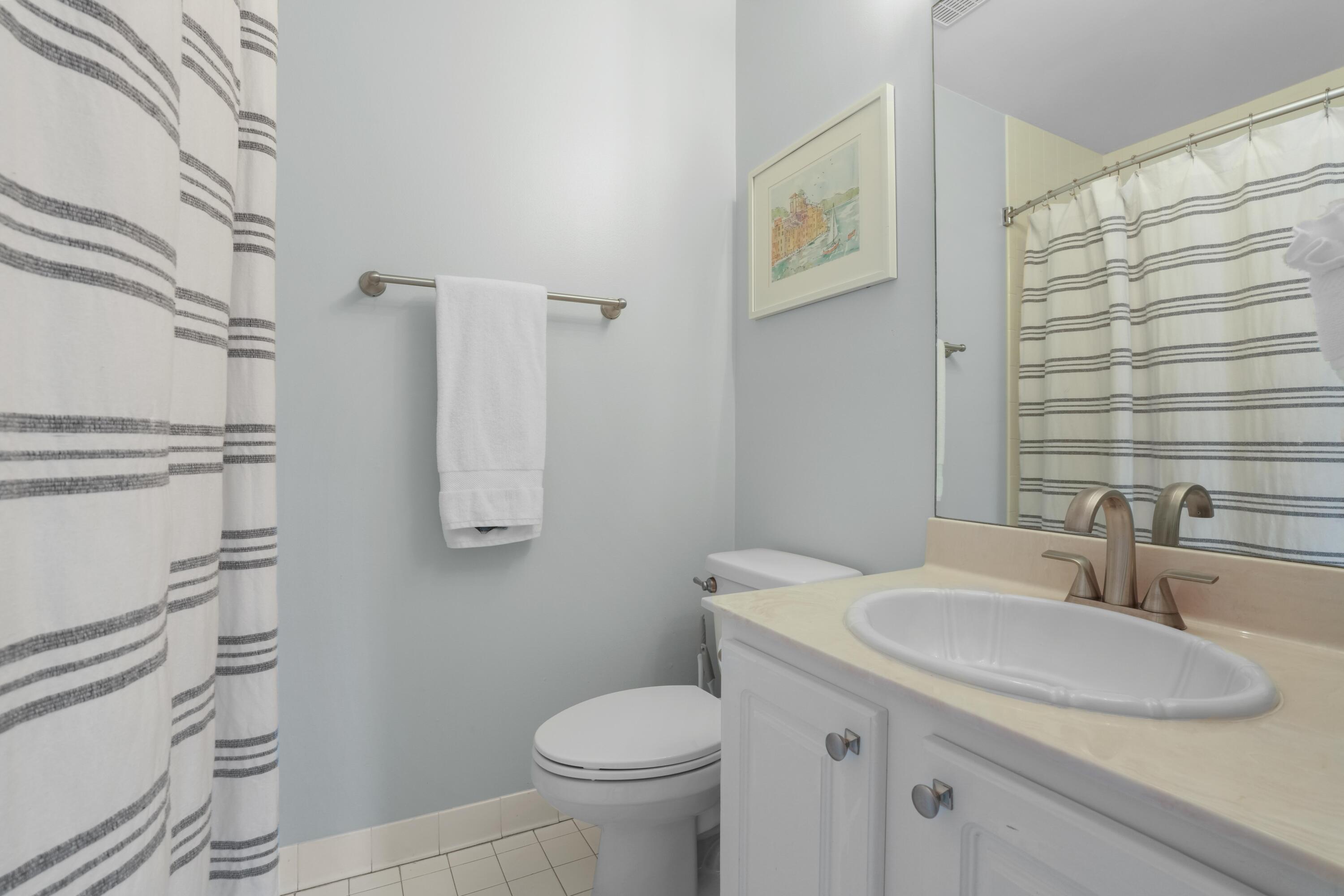 12 Windancer Lane Miramar Beach, FL 32550 - Photo 32 of 42 a bathroom with a sink toilet and shower