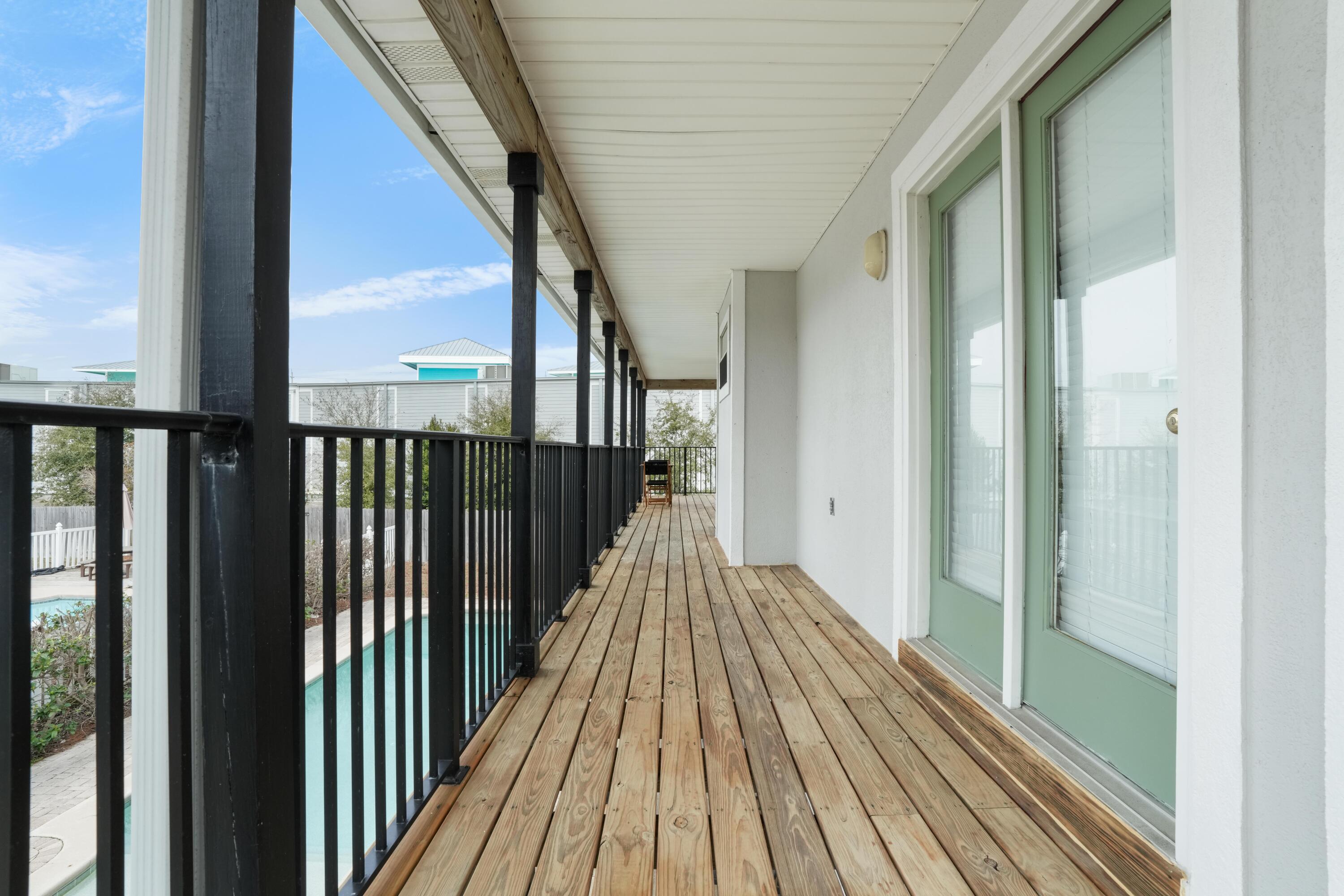 12 Windancer Lane Miramar Beach, FL 32550 - Photo 35 of 42 a view of balcony with wooden floor