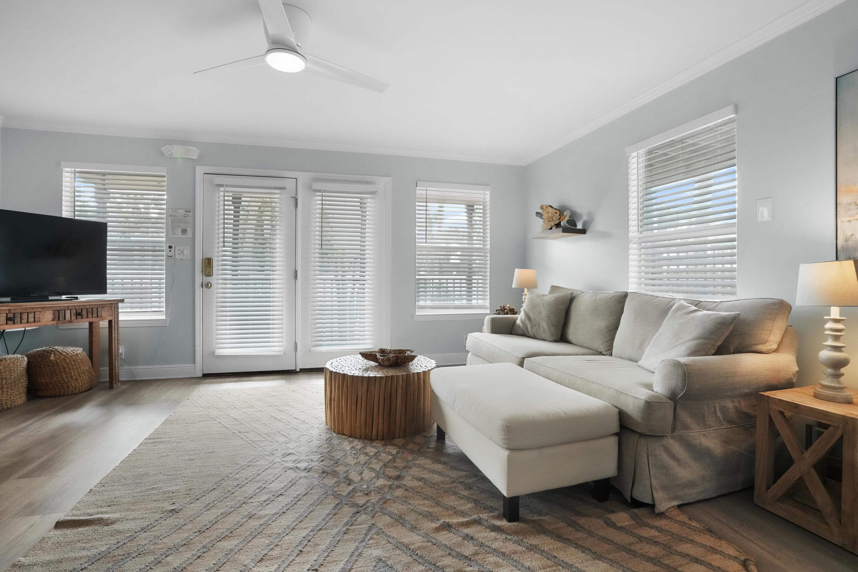 12 Windancer Lane Miramar Beach, FL 32550 - Photo 4 of 42 a living room with furniture and a flat screen tv