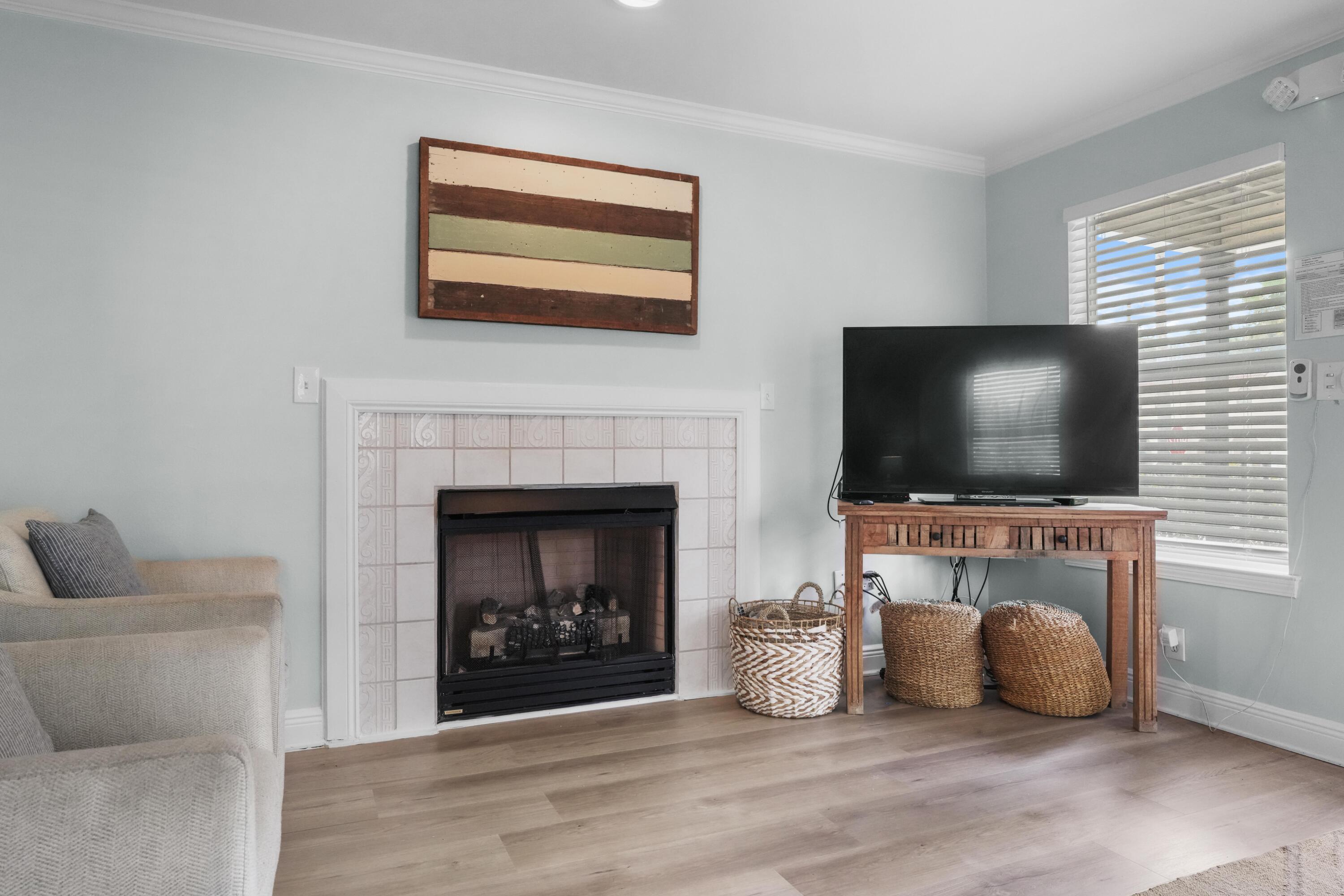 12 Windancer Lane Miramar Beach, FL 32550 - Photo 8 of 42 a living room with furniture and a flat screen tv