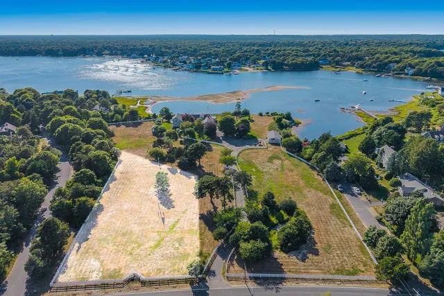 an aerial view of a houses with outdoor space