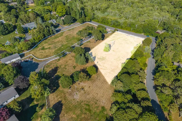 a view of a yard with a swimming pool