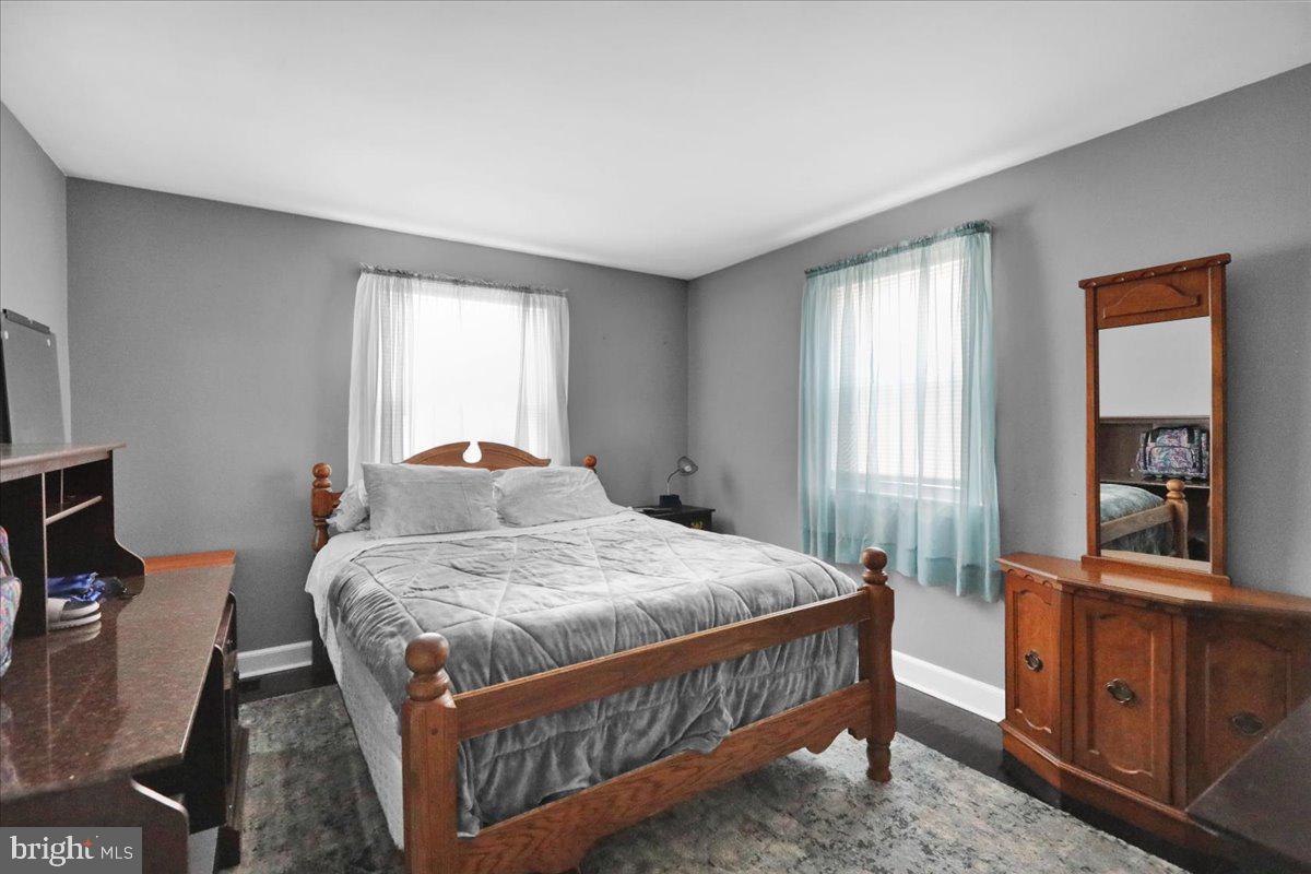 135 Chestnut Street Shillington, PA 19607 - Photo 18 of 34 a bedroom with a bed and a dresser