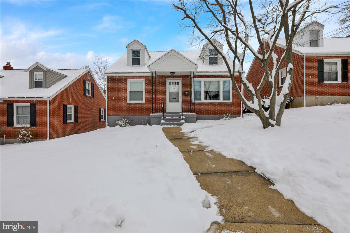 135 Chestnut Street Shillington, PA 19607 - Photo 2 of 34 a front view of a house with yard and parking
