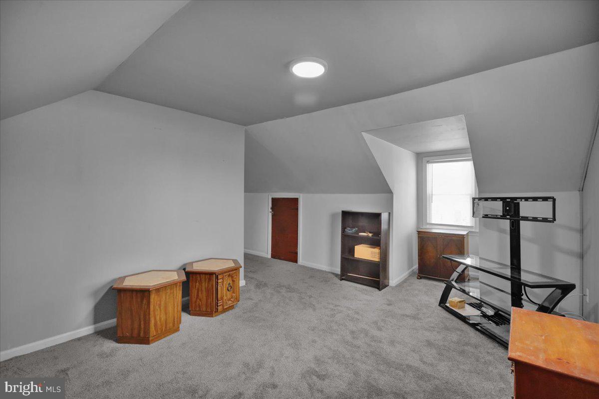 135 Chestnut Street Shillington, PA 19607 - Photo 22 of 34 a view of a livingroom with furniture and a fireplace