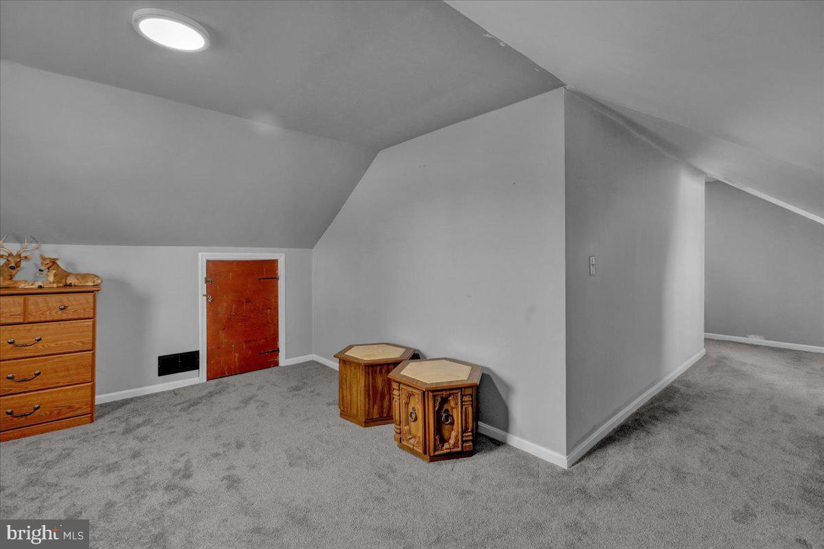 135 Chestnut Street Shillington, PA 19607 - Photo 23 of 34 a view of an empty room and storage